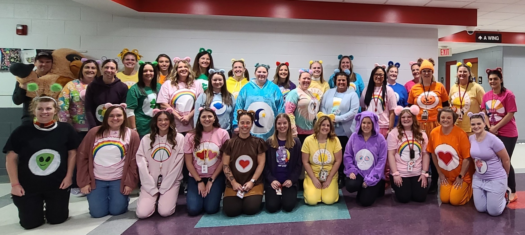 DEL Staff for Halloween in CareBear costumes