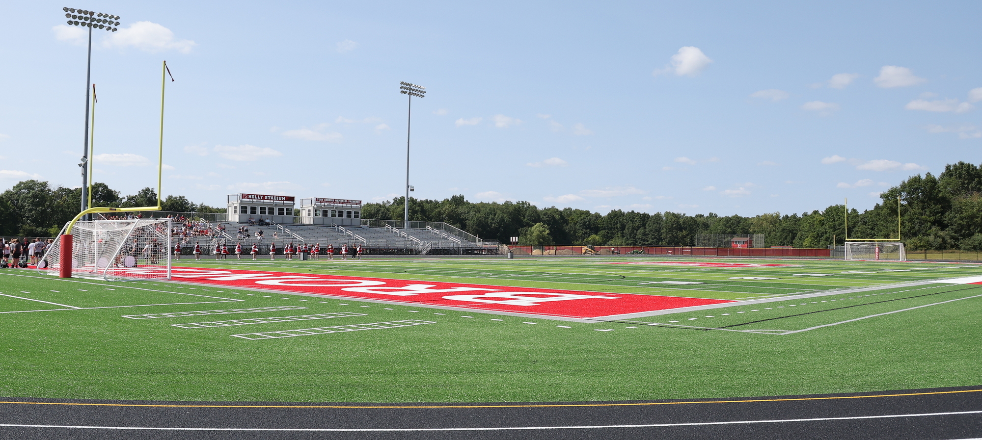 football field with pressboxes in the background