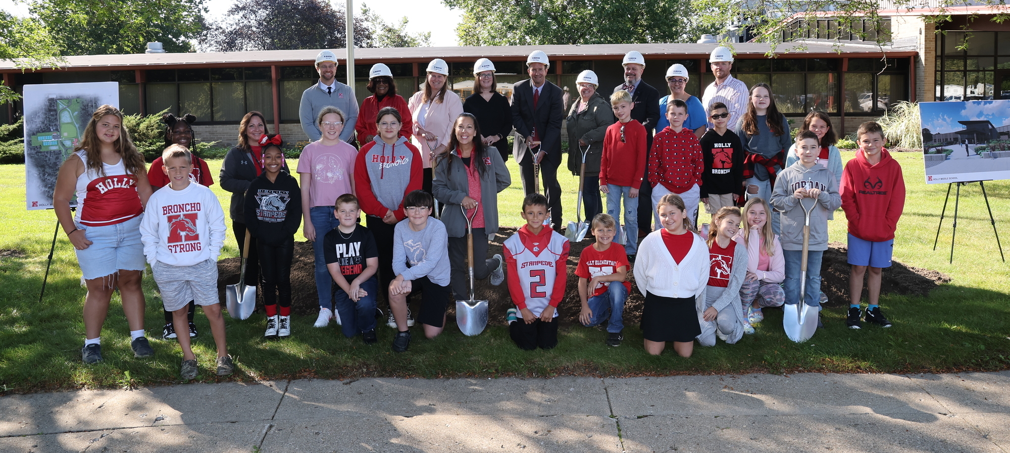 Students and Board members at ground breaking for the new middle school